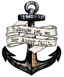 Decorative anchor-shaped magnet with text "Zuhause ist, wo der Anker fällt" (Home is where the anchor falls).