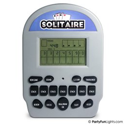 Retro pocket solitaire game with digital display and buttons for gameplay. Compact and portable design.