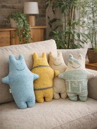  "Soft yellow hippo plushie toy, vintage wool material, cuddly stuffed animal with cute face"