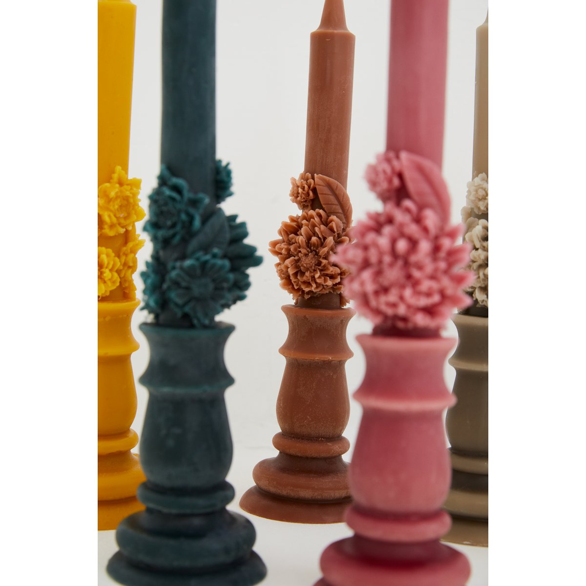 Raw beeswax candela with flowers