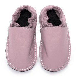  Soft, comfortable pink leather slippers with a cozy interior lining. Suitable for indoor or outdoor wear.