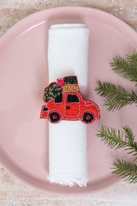 Paar broches: Kerstauto