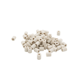 Ceramic beads in bulk, suitable for water filters. The beads are white in color and have a cylindrical shape.