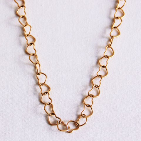 Linked hearts necklace