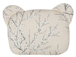 Soft, beige crib pillow with a nature-inspired branch pattern.