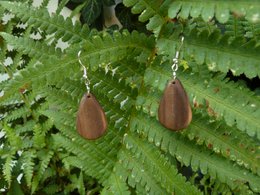 Drop-shaped hanging earrings made of fine walnut wood, very light, matt oiled surface