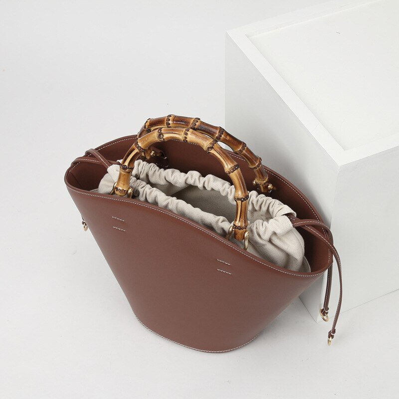 Cap-Ferrat Yatch Bambus Millésime Kakao Abendtasche