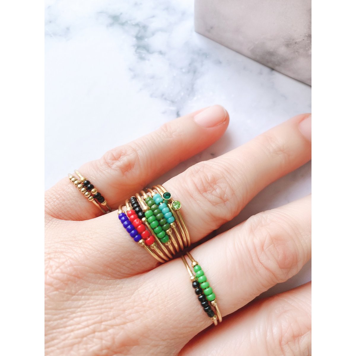 R0990 Angst Ring Palme SchwarzPerlen Vergoldet