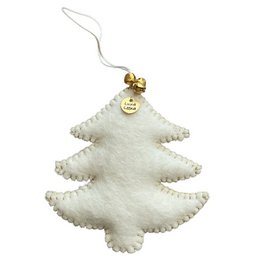  A handmade, off-white and gold wool felt Christmas tree ornament with a bell and gold accents, perfect for adding a touch of holiday cheer to your decor.