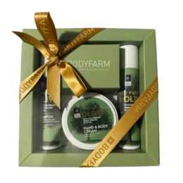  Pure olive gift set, three-piece skincare collection, green packaging, gold ribbon bow, natural cosmetics.