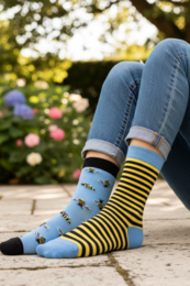 "Blue and yellow striped women's socks with bee pattern design, cotton blend, casual style"