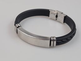 Handmade adjustable leather bracelet with gemstone charms in a variety of colors and patterns.