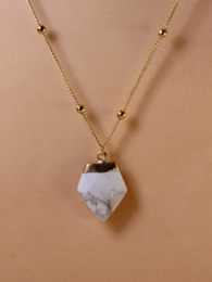 Turquoise pendant necklace with gold chain and beads.