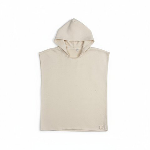 Kinderponcho van 100% katoen in de kleur beige