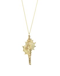 A gold-toned pendant necklace featuring a decorative shell-shaped charm.