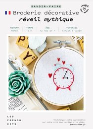Embroidery kit featuring a mythical design with a rose, clock, and colorful threads. Includes materials for a decorative, artistic needlework project.