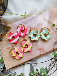  Striped flower earrings, colorful statement jewelry, fuchsia pink yellow blue, bold floral design.