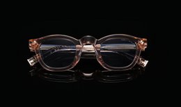 Sparkling champagne-colored sunglasses with a classic square frame shape.
