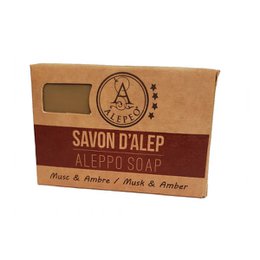 Aleppo olive soap bar with musk and amber scent, rectangular shape, natural ingredients.