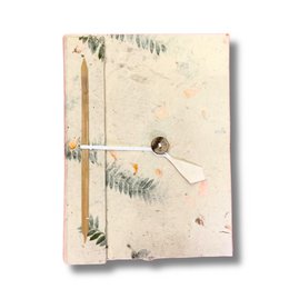  A handmade notebook with a nature-inspired cover featuring a pressed flower or leaf design. The notebook has a rustic, earthy aesthetic with a textured cover and exposed binding.