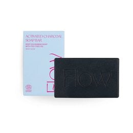 Detox - Tea Tree & Charcoal facial cleanser, a black square-shaped bar soap with a textured surface, suitable for cleansing and detoxifying the skin.