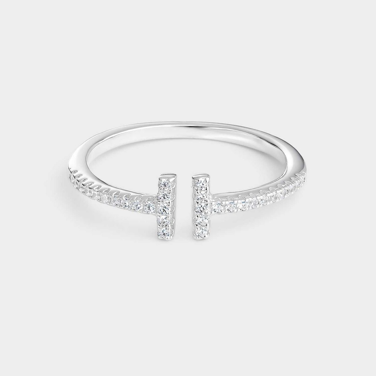 Silver ring with white zircons