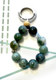 Keychain made of Indian agate beads in shades of green and blue, with a metal keychain ring.