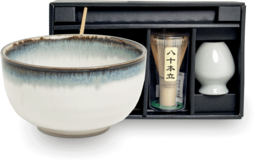 Large ceramic matcha bowl, bamboo whisk, and matcha powder in a gift box set.