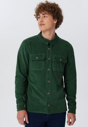  Unisex corduroy shirt in a dark green color, featuring a button-down collar and chest pockets. Available in sizes XS to XL.