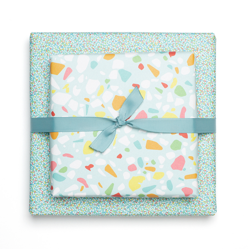 Colorful wrapping paper turquoise with terrazzo pattern, children pack gifts for children's birthday, for school or at birth