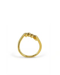 Gold-plated statement ring with a unique twisted design.