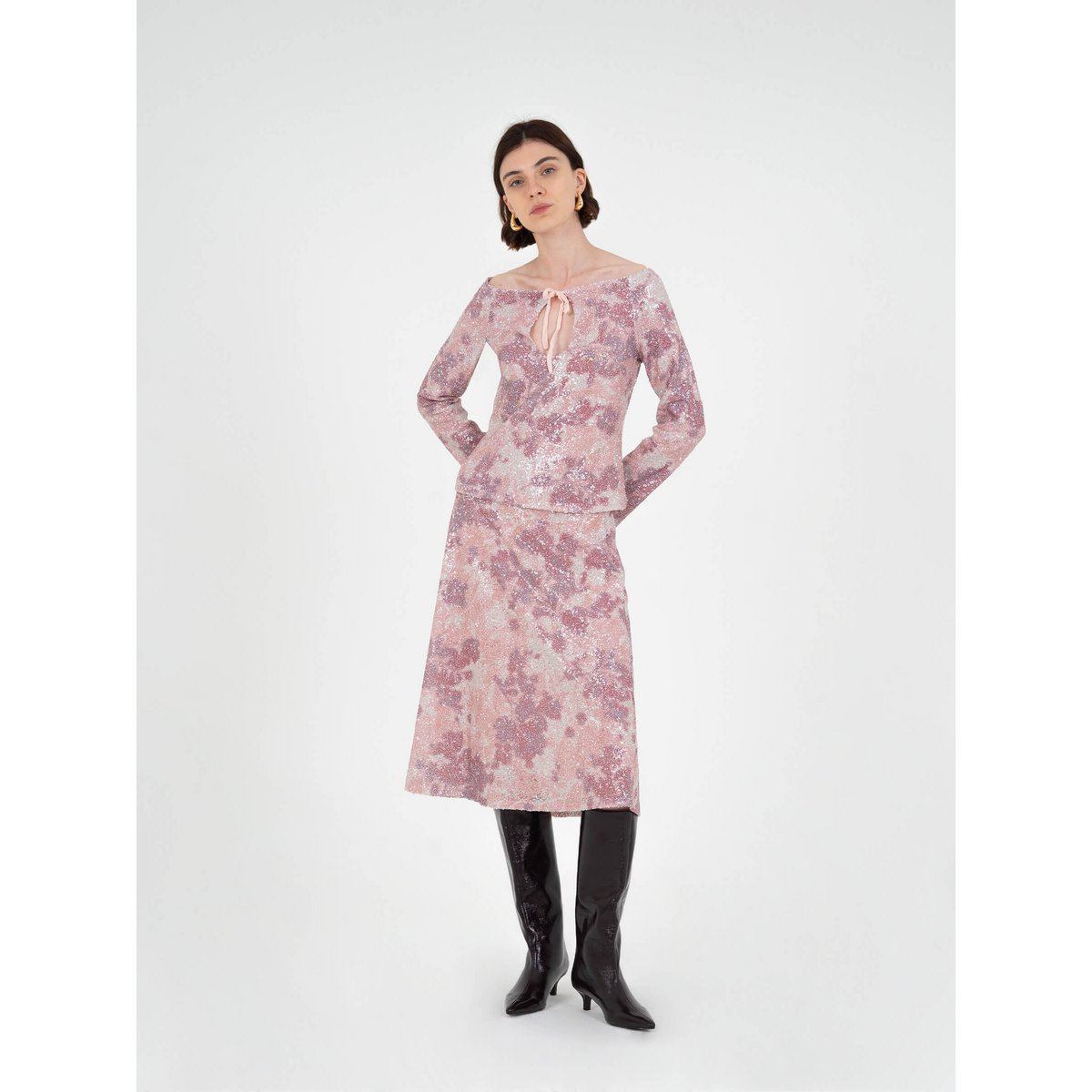 Top met sterrenprint en pailletten