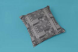 Square cushion cover in a geometric patterned design, made of cotton and polyester, measuring 40cm x 40cm.
