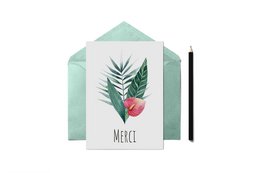 Tropical leaf and flower design on a white greeting card with the French word "Merci" (Thank you) written on it.