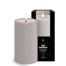 Tall, cylindrical LED candle in a sand color, measuring 7.5 x 12.5 cm. Part of the iTRE LED candle collection.