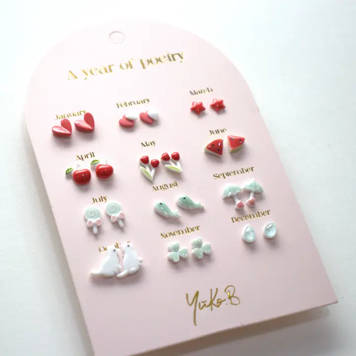 Card of 12 Earrings A Year of Poetry red English