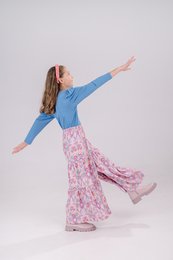Twist viscose floral maxi pants for kids, available in sizes 4*5, 6-8, 8-10, and 10-12. The pants feature a floral print design and a relaxed, flowing silhouette.