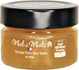 Pear, tonka bean, and honey blend in a 150g jar. Sweet and aromatic honey product.