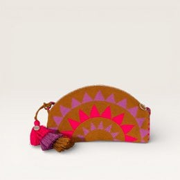 Geometric half-moon clutch, mauve pink gold, colorful pattern, tassel detail, semicircle shape.