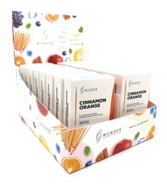 Colorful fruit-flavored toothpicks display box with cinnamon, mint, orange, cherry flavors and vibrant fruit illustrations.