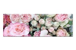 A soft pink table runner with delicate rose and peony floral arrangements.