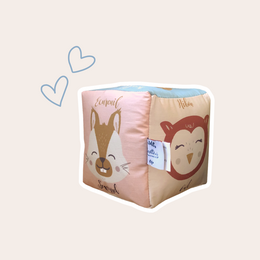 A soft, plush cube toy featuring forest animal designs, including a rabbit and monkey. The cube is made of high-quality materials and is suitable for babies and young children.