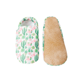  Baby shoes with a cactus and flamingo print. Soft, comfortable material with a textured sole for grip.