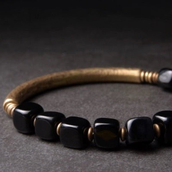 Bracciale a blocchi di ossidiana nera con bracciale rigido in bronzo