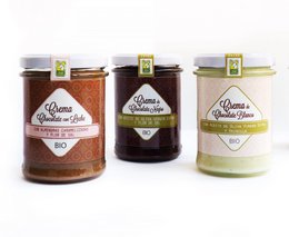 Creamy chocolate spread in three flavors - white, milk, and dark. Packaged in a box of 9 individual jars.