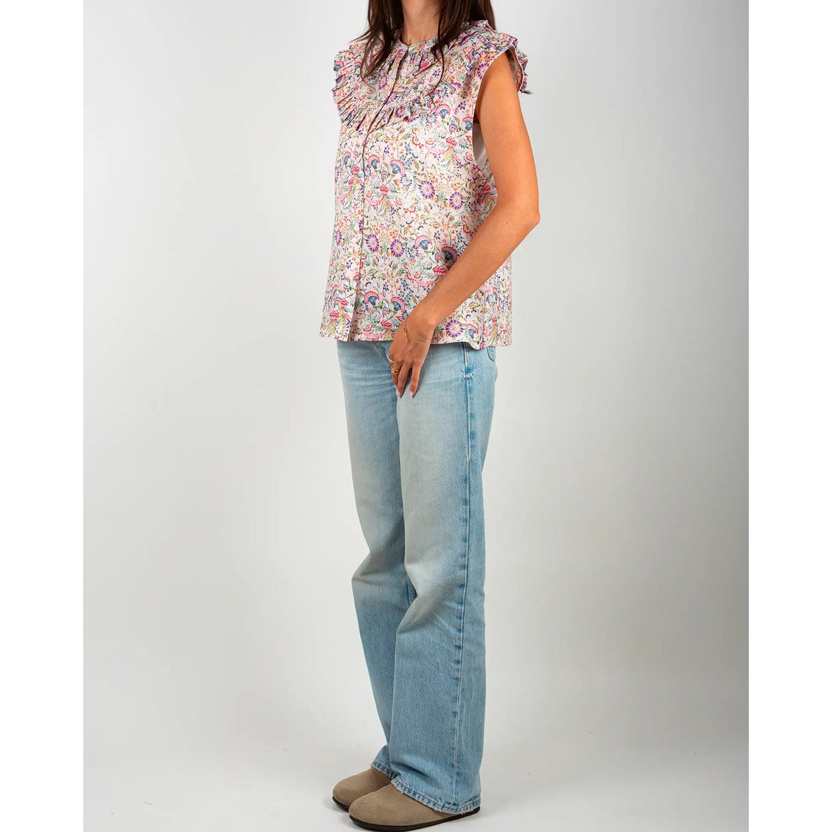 La blouse femme sans manches à volants Febre rose