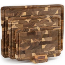 Set of 3 acacia wood cutting boards with natural wood grain pattern.