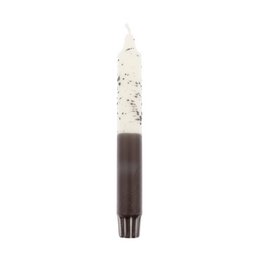 Tall, round white and black dip-dyed dinner candle with confetti-like speckles.