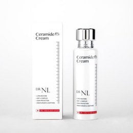 White ceramic cream bottle with silver pump dispenser, 4% ceramide skincare product, minimalist packaging design.