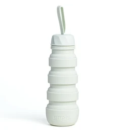 Tall, cylindrical drinking bottle in a light green color with a straw-like lid. Made of durable, reusable materials for travel and outdoor use.